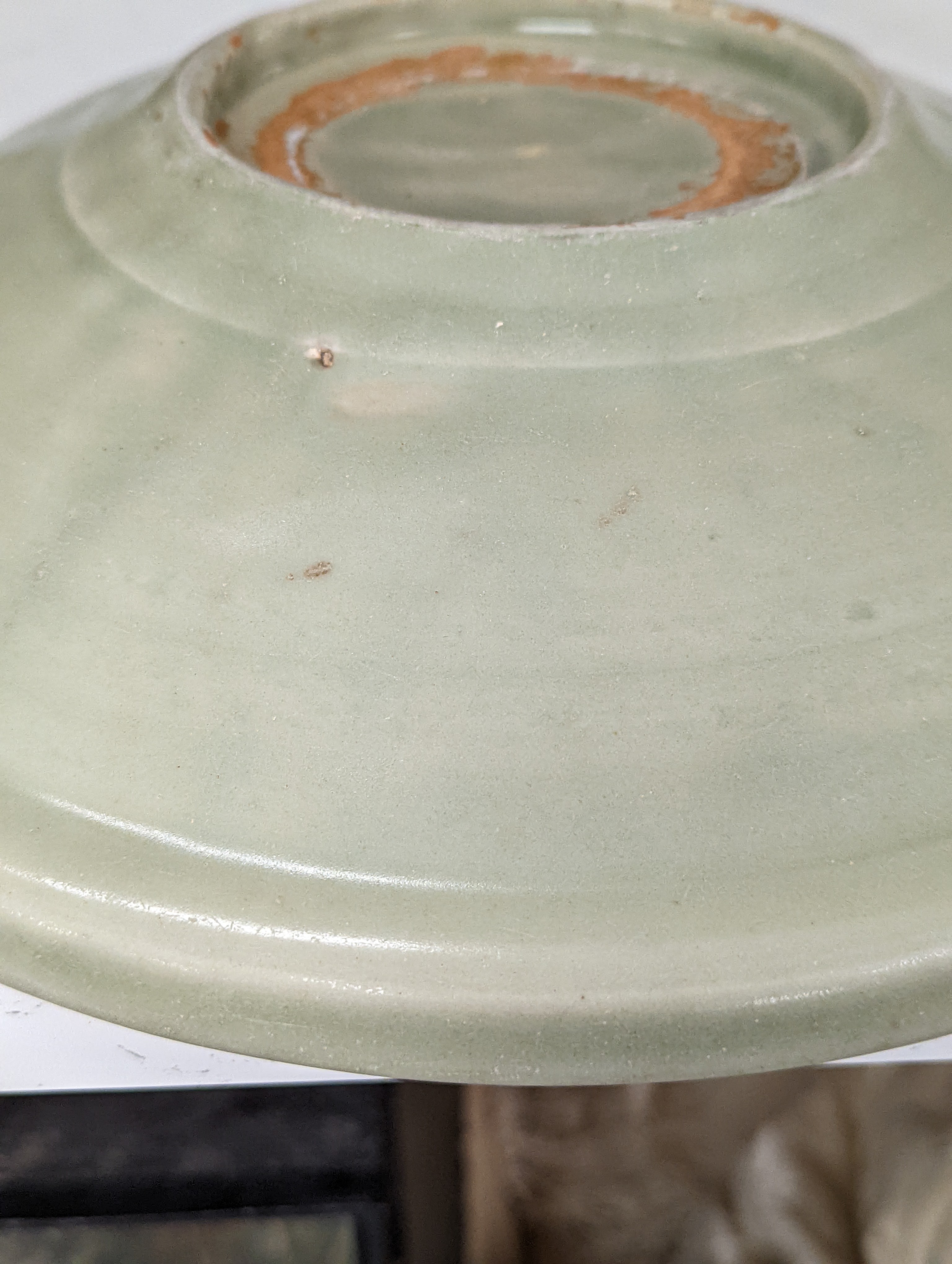 A Chinese Longquan celadon dish, 14th/15th century - 29cm wide